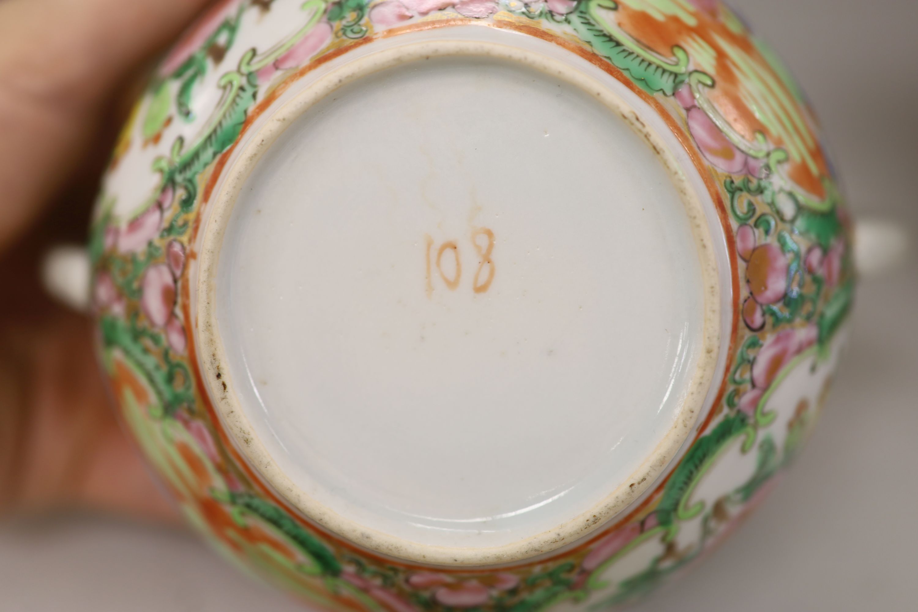A Chinese famille rose box and cover, two vases, a sugar bowl and cover and a saucer, late 19th/early 20th century, tallest 19cm